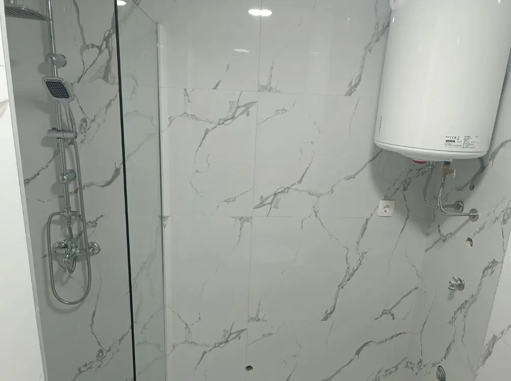 Dio kupatila sa tus kabinom